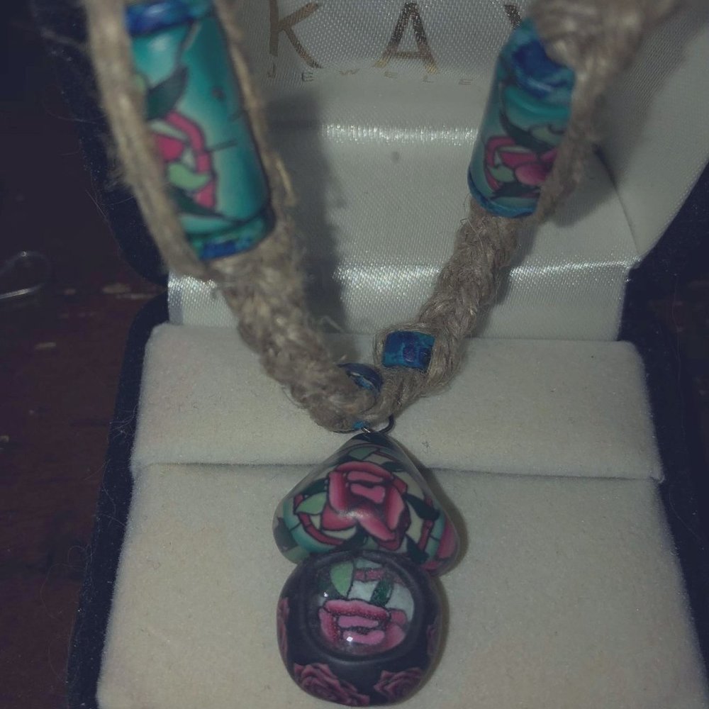 mushroom necklace on braided rope